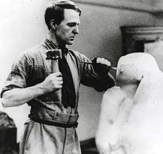 Henry Moore carving in stone